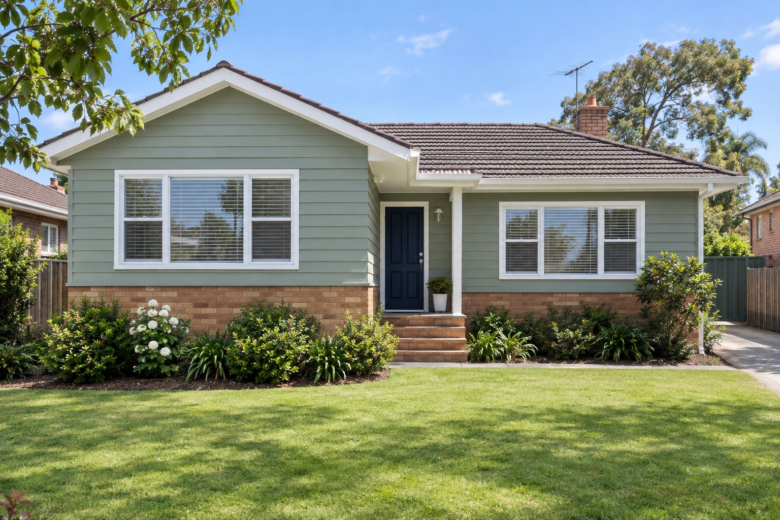 Exterior painting of a weatherboard home